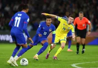 Soccer-France keep celebrations restrained after World Cup qualification