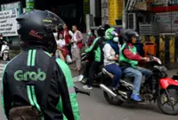 Indonesia’s push for Grab-GoTo merger driven by politics, analysts say