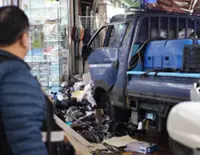 South Korea police seek to hold driver after market crash kills 2