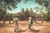 More tourists cycle to visit temples in Cambodia's Angkor complex