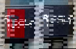 Tesla working to integrate Apple CarPlay in its EVs, Bloomberg News reports