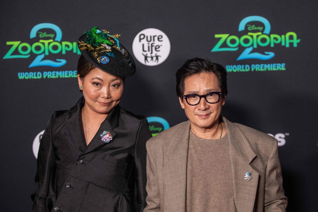 US-Vietnamese actor Ke Huy Quan (right) and Echo Quan attend the world premiere of Walt Disney Animation Studios' - Zootopia - in Los Angeles, California. --Photo by Apu GOMES / AFP