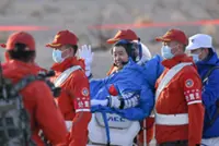 Stranded Chinese astronauts return home from space station mission