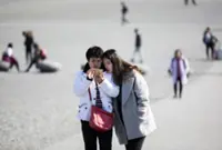 Japan urges China to take steps after it discouraged visits to Japan, Kyodo reports