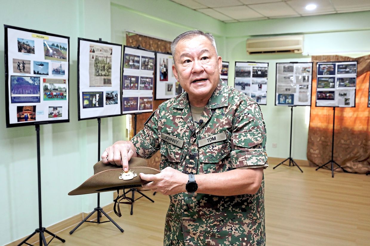 Courage and honour | The Star 4 Lim sharing some of his photos and memorabiliaduring the course of his military career. — Photos: SAMUEL ONG/The Star