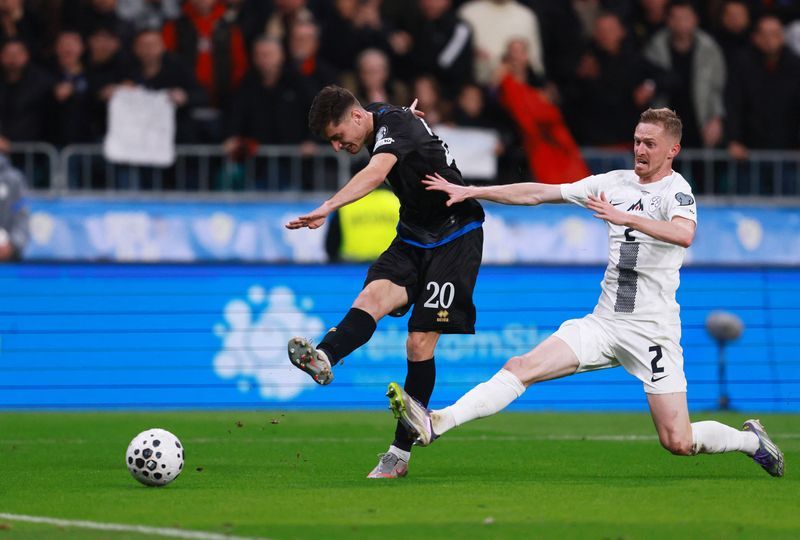 Soccer-Kosovo win 2-0 in Slovenia to secure World Cup playoff spot