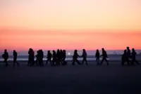 Britain to make refugee status temporary under asylum overhaul