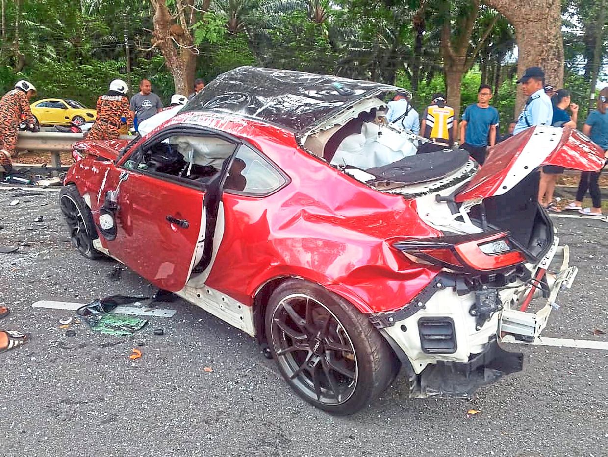 Driver killed in sports car collision with bus
