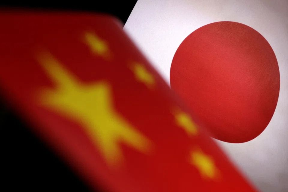 China escalates Japan spat with threats of economic reprisal