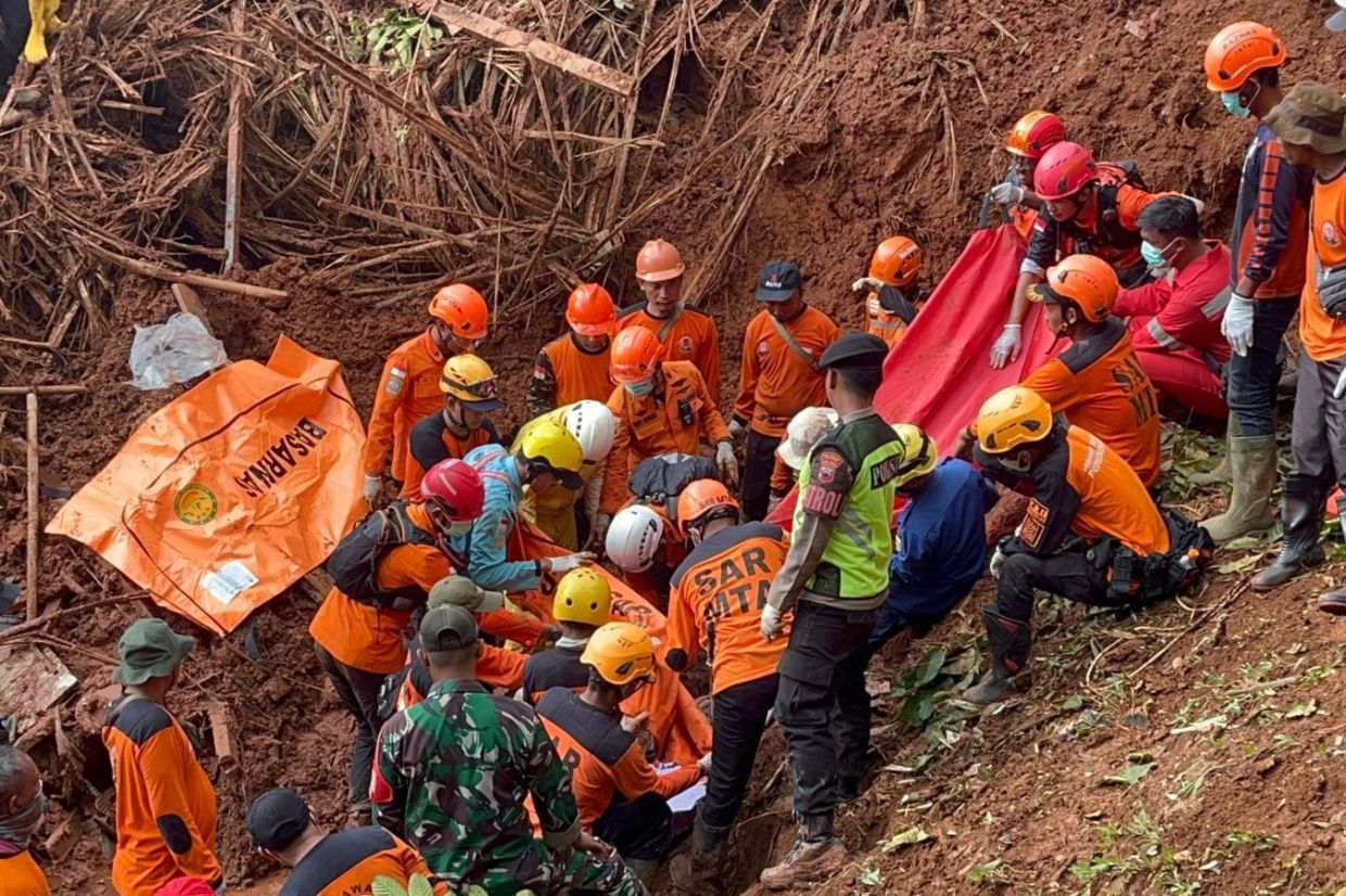 The Indonesian National Search and Rescue Agency (BASARNAS) on Monday, Nov 17, 2025, rescues a victim of a landslide after a recovery programmme in Cilacap, Indonesia. (BASARNAS via AP)
