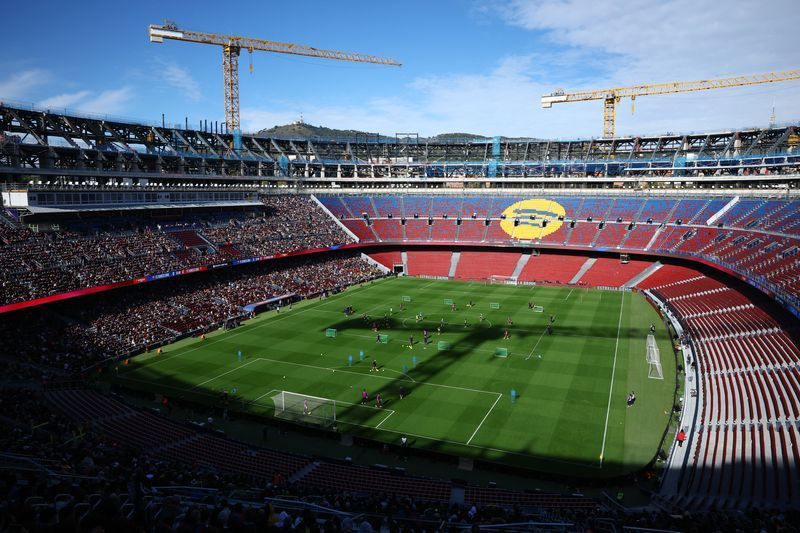 Soccer-Barcelona to return to Camp Nou on Saturday after two years