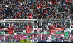 Soccer-Last-gasp Parrott hat-trick books Ireland playoff spot over Hungary