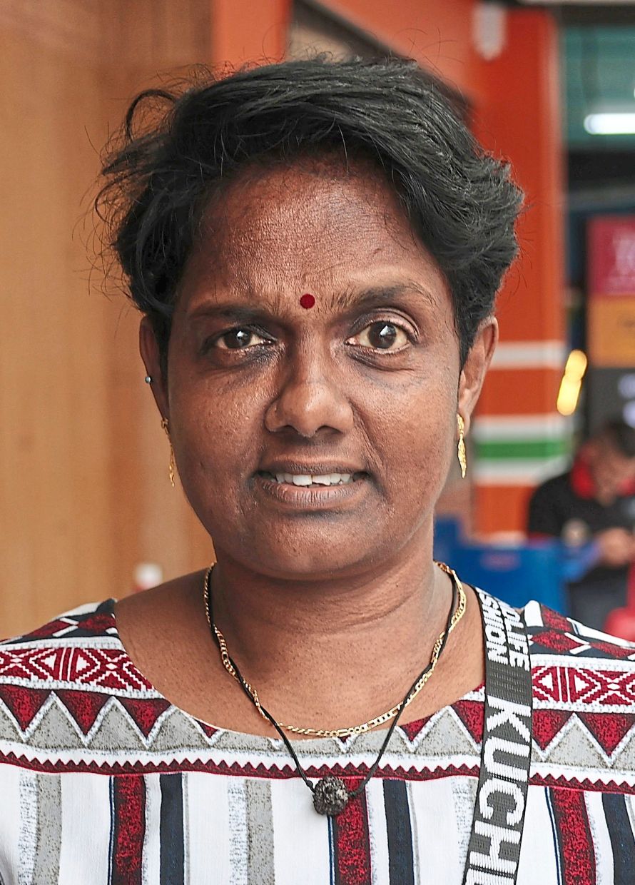 Sita is grateful for the aid to buy school essentials for her children.