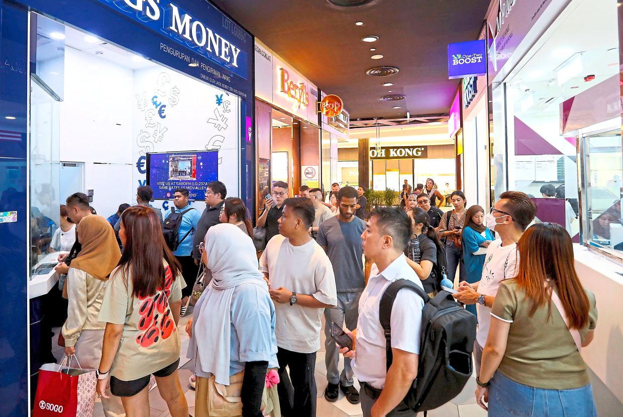 Malaysians in money rush