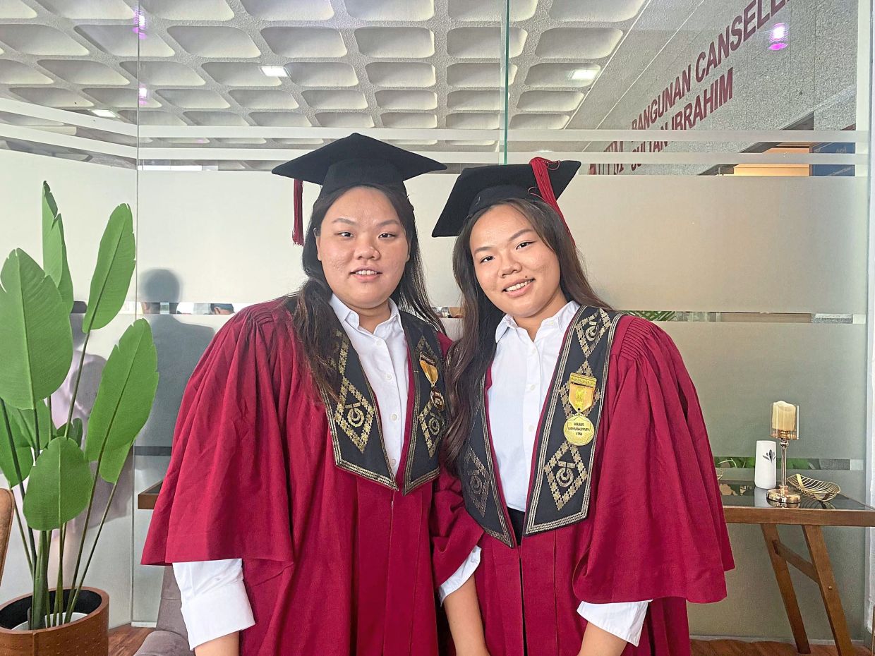 Inseparable twins celebrate double triumph in engineering