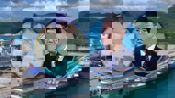 Chinese man who donated US$20 as child to aircraft carrier project visits fleet 26 years on