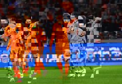 Soccer-Dutch coach lauds potential and quality of his squad