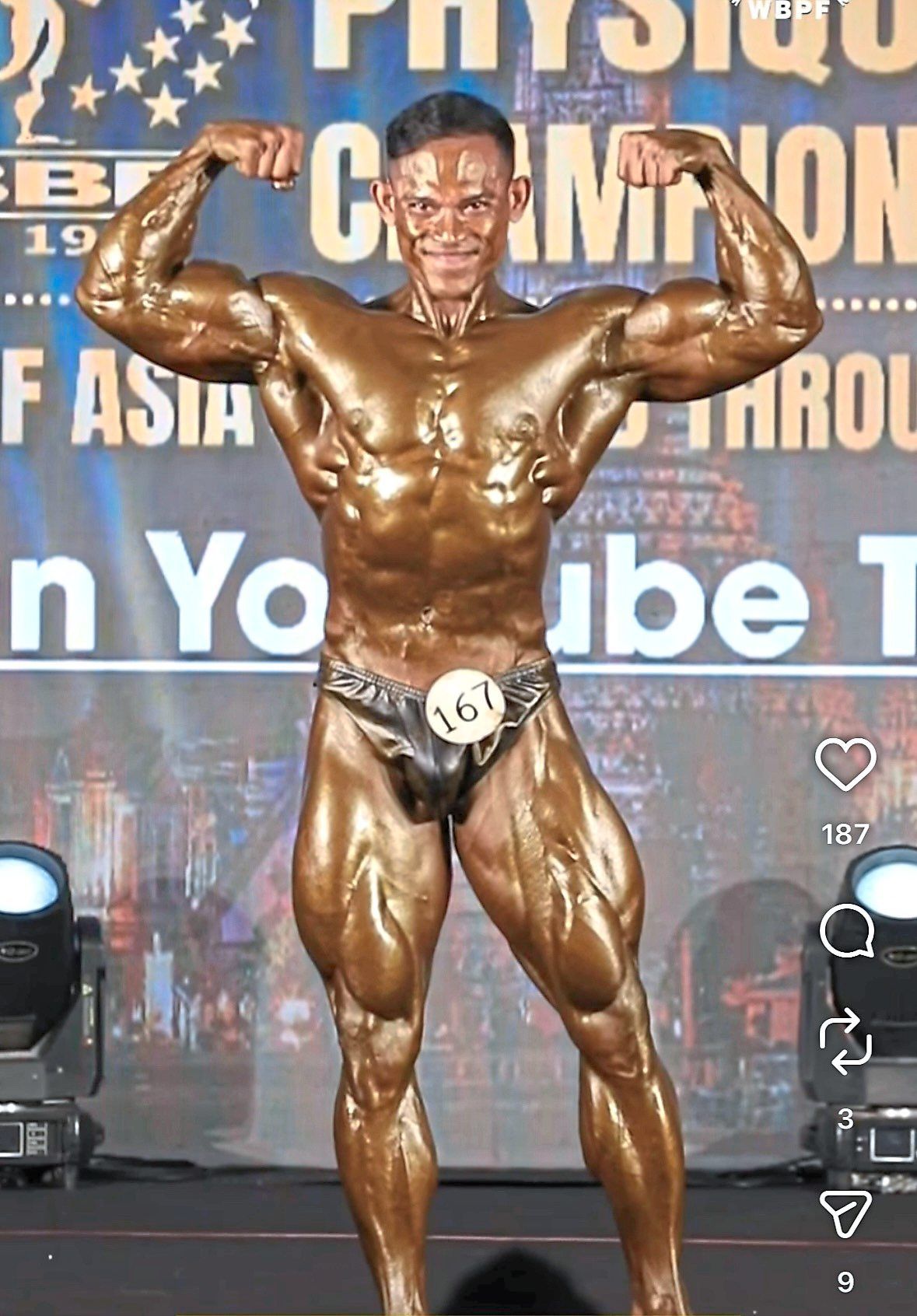 Brawns of gold: Abdul Aziz Ahmad flexing it en route to winning the top prize in the athletic physique 167cm category at the World Bodybuilding and Physique Sports Championships in Batam, 