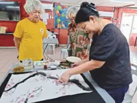 Brushing up on joy: Seniors embrace Chinese painting