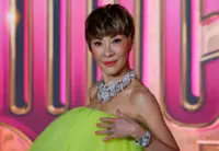 Michelle Yeoh shows off yet another hairstyle and bold look at 'Wicked: For Good' premiere