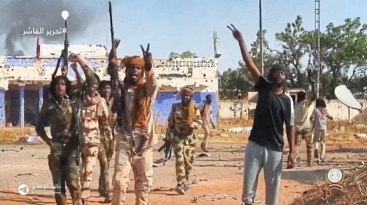 RSF fighters celebrating on the streets of El-Fasher in Sudan’s Darfur. — AFP