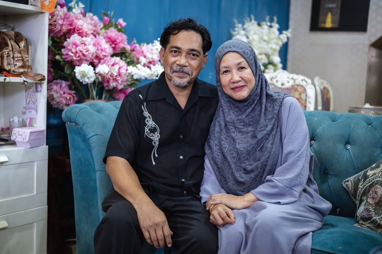 Shahronizam Noor with wife Safura Yaacob.