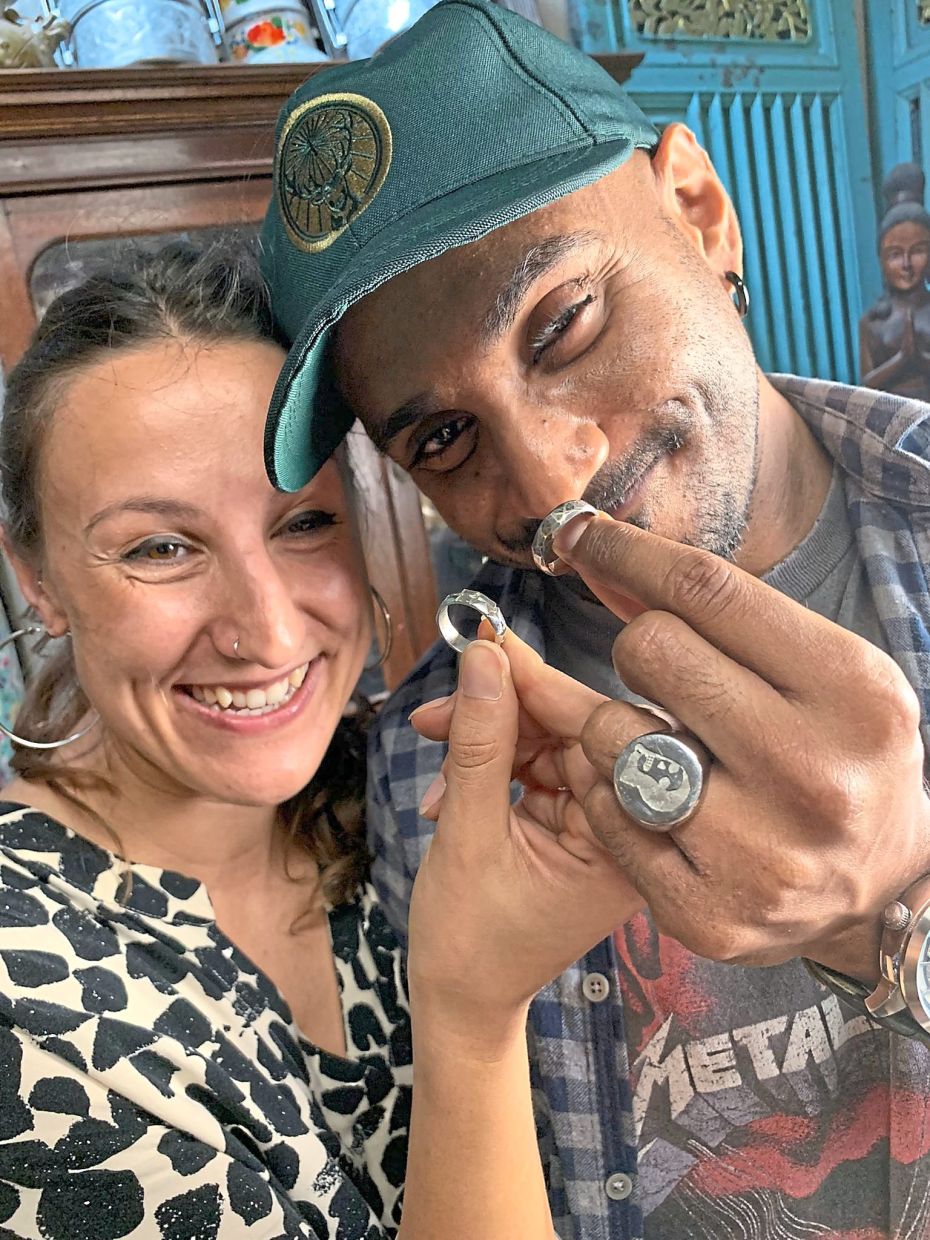 Kabilan (right) and Kobler with the handcrafted rings symbolising their commitment to each other.Photos: Leroy Luar