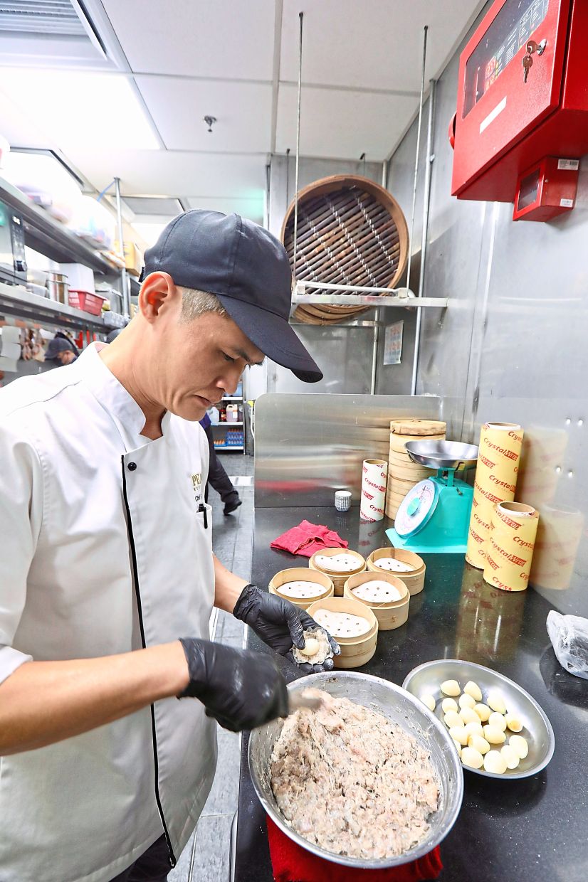 One of the chefs making ‘siu mai’.