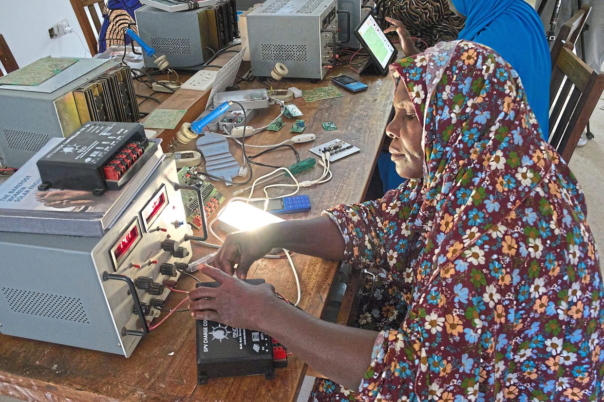 The programme selects middle-aged women to become technicians. Photo: AP