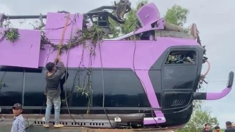 A night bus from Cambodia's top tourist destination plunges off a bridge, killing 16 passengers