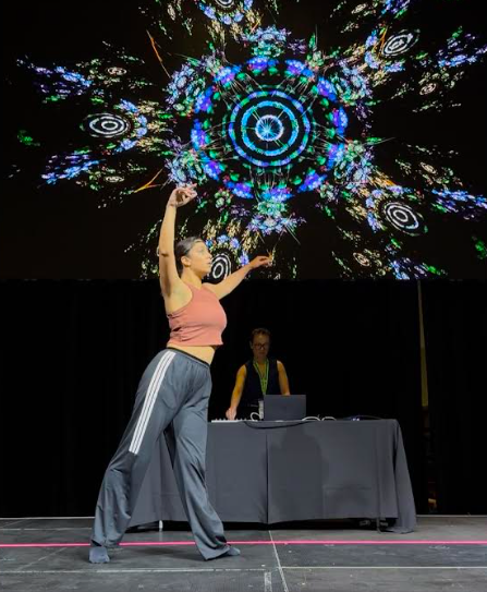 Chong (in the background) monitors dancer Natalie Cunzolo's EEG levels during the new media performance. Photo: Handout 