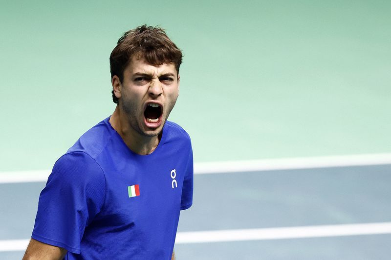 Tennis-Battling Cobolli sends holders Italy into Davis Cup final