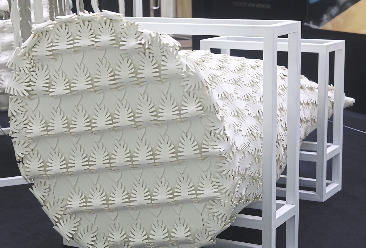 Syakir retained the sculptures’ original white EVA foam, letting visitors focus on the feather shapes, cut by laser and hand. Photo: The Star/Samuel Ong