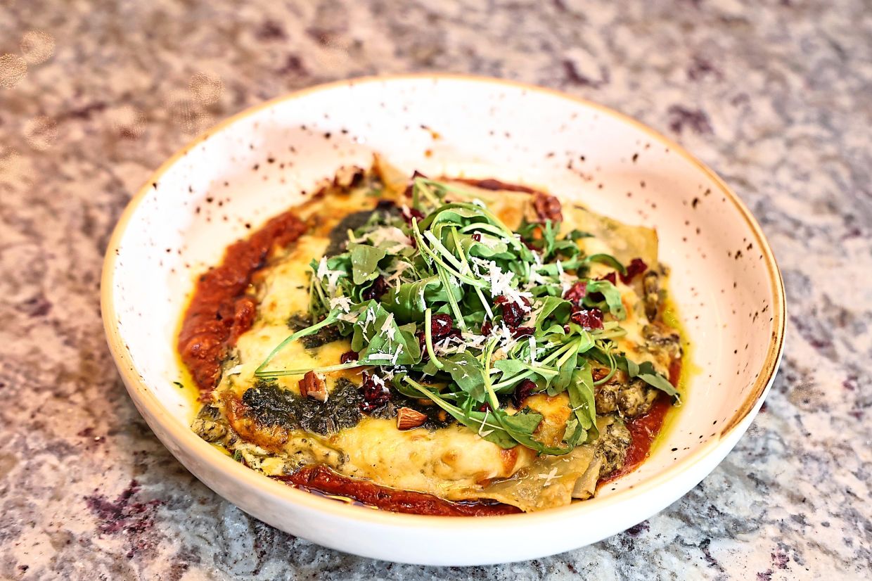 The spinach and artichoke cannelloni is a dish that represents the ultimate in holiday indulgence. — AZMAN GHANI/The Star