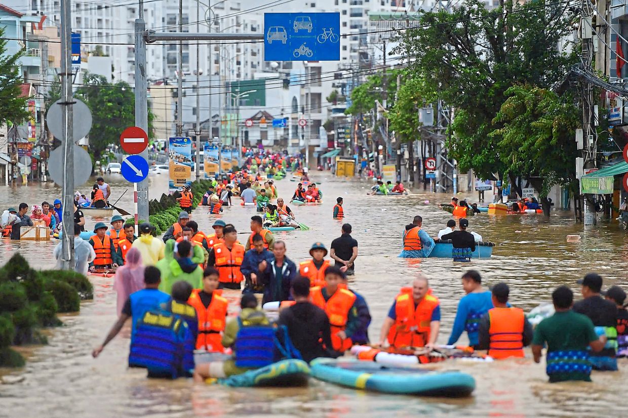 Flooding death toll hits 55, with 13 missing