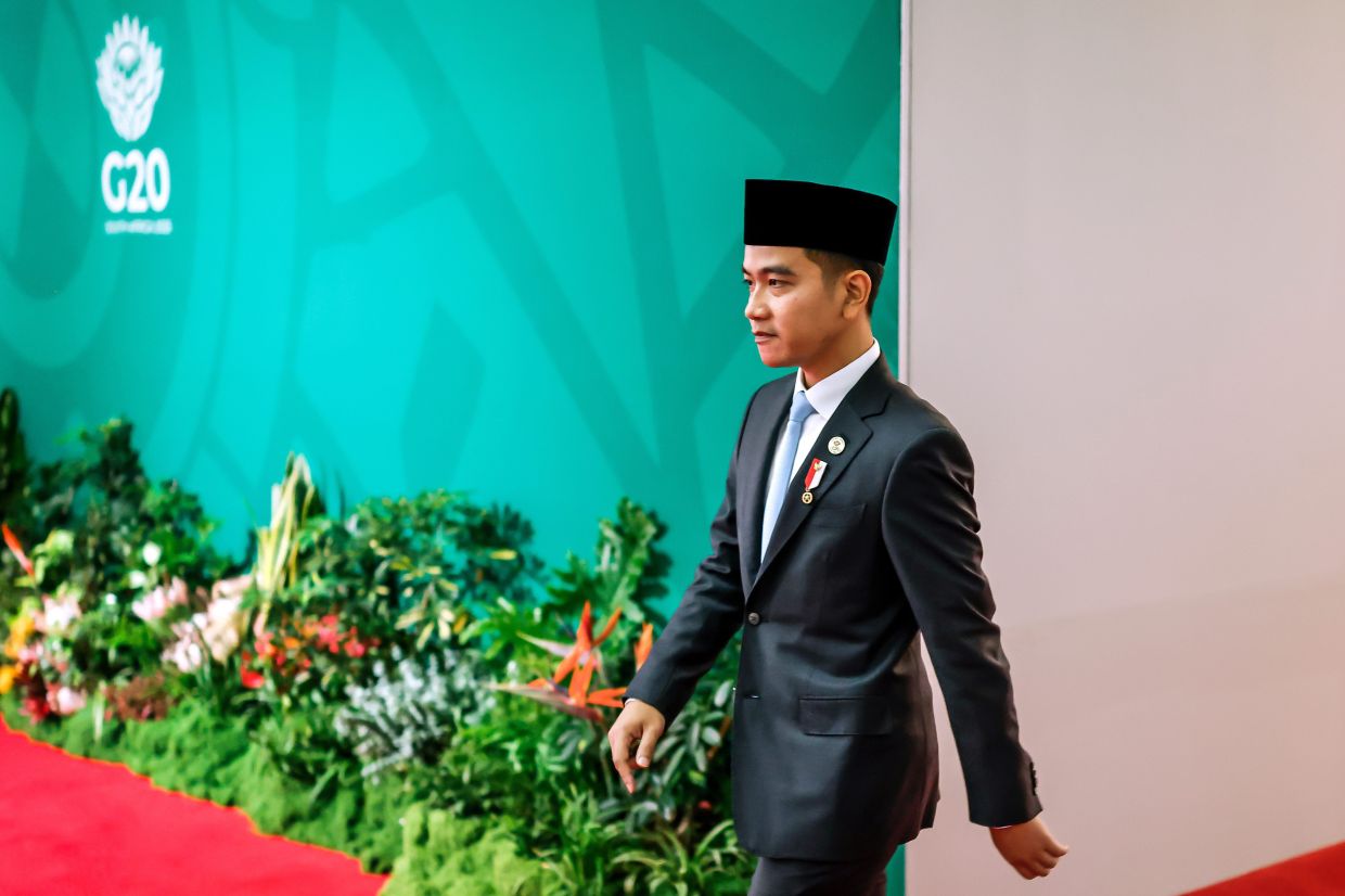 Indonesia's Vice President Gibran Rakabuming Raka arrives for the second day of the G20 Leaders' Summit, in Johannesburg, South Africa, Sunday, Nov 23, 2025. -- Marco Longari/Pool Photo via AP