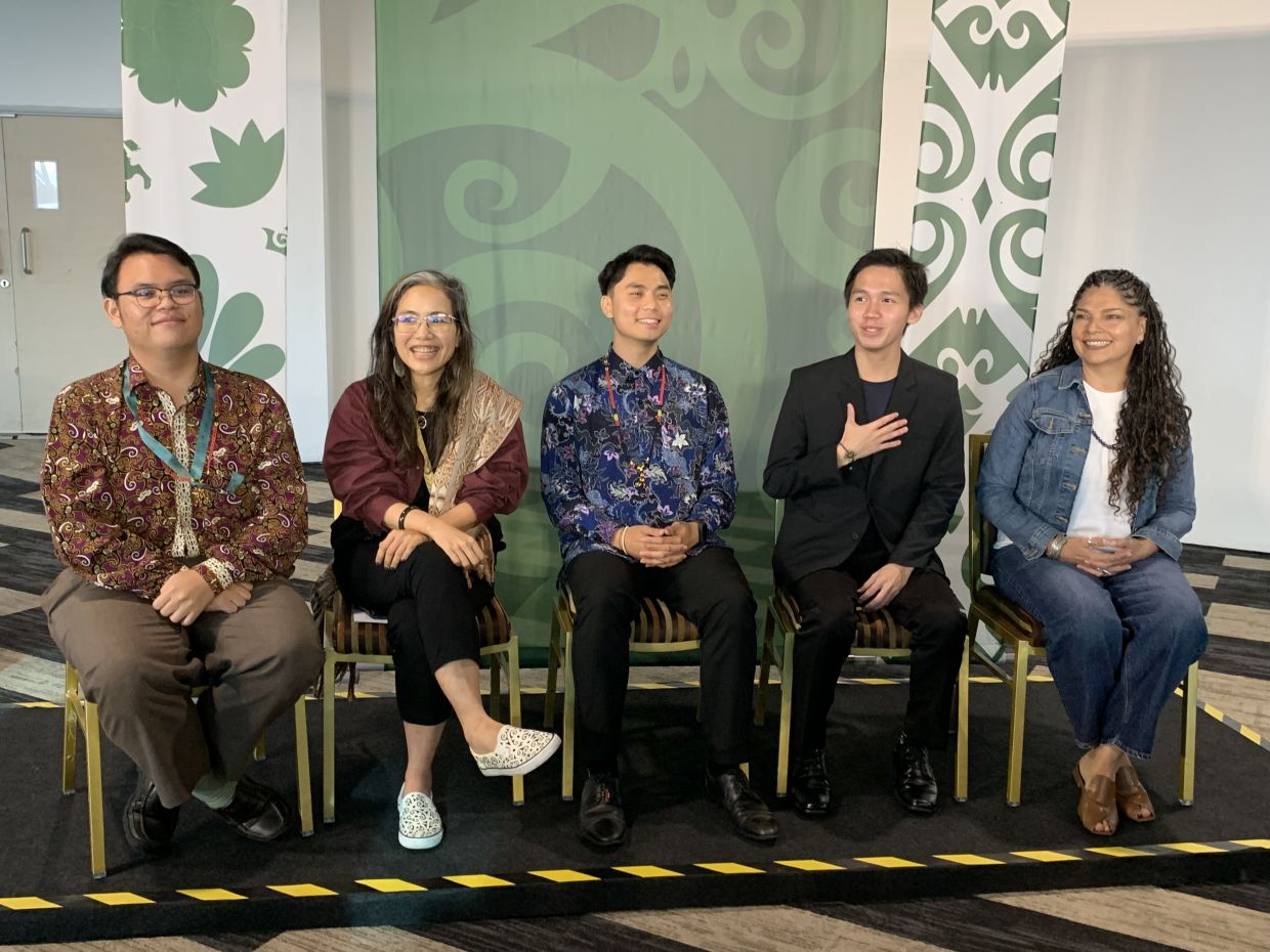Han (centre) with Then on his left in a press conference at RAYS 2025. With them are fellow speakersUNDP consultant working on meaningful youth engagement Joshua Anak Belayan; Bidayuh scholar and indigenous strategist Dr June Rubis and conservation biologist Dr Erika Cuellar Soto.