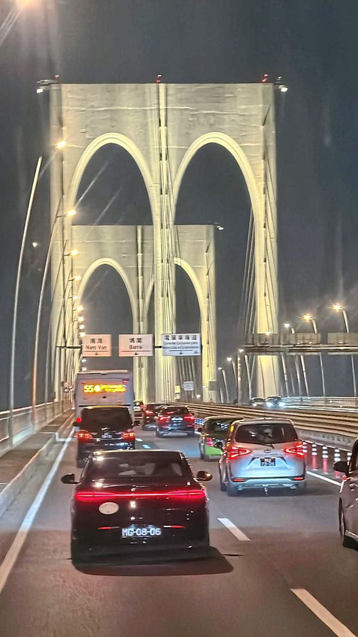 The Sai Van Bridge connects the Macao peninsular to Taipa Island across the Praia Grande Bay.