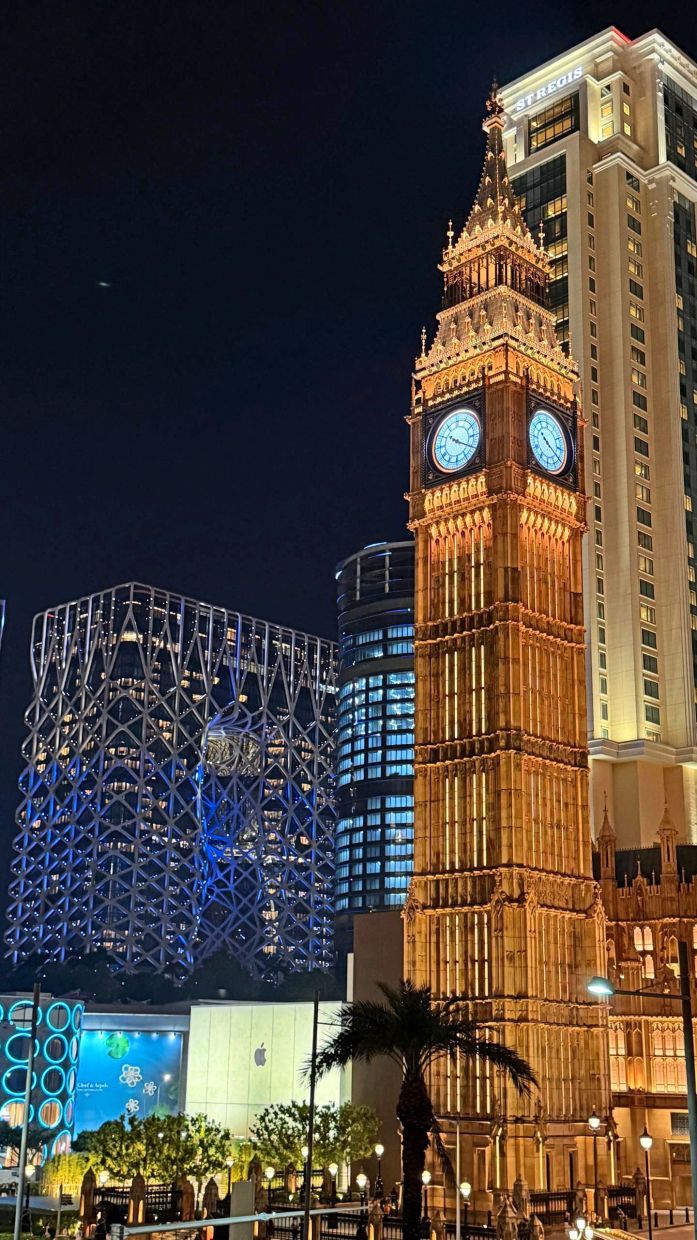 Many buildings in Taipa are lit up at night, creating a beautiful nocturnal scene.