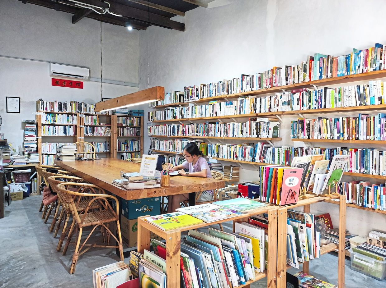 With a collection of over 1,500 books, Ruang Kongsi offers visitors plenty of space to lose themselves in reading. Photo: Andrea Filmer 