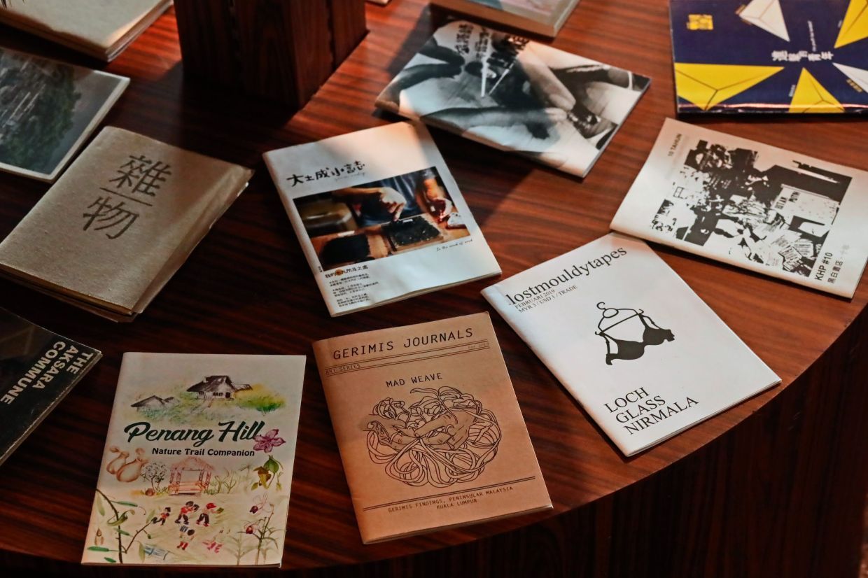 A mini exhibition entitled 'Table Of Zines' – featuring 150 zines – is currently showing at Books R&R until Nov 30. Photo: Oh Chin Eng 