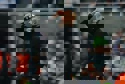 Soccer-Man City's Guardiola apologises for confrontation with cameraman