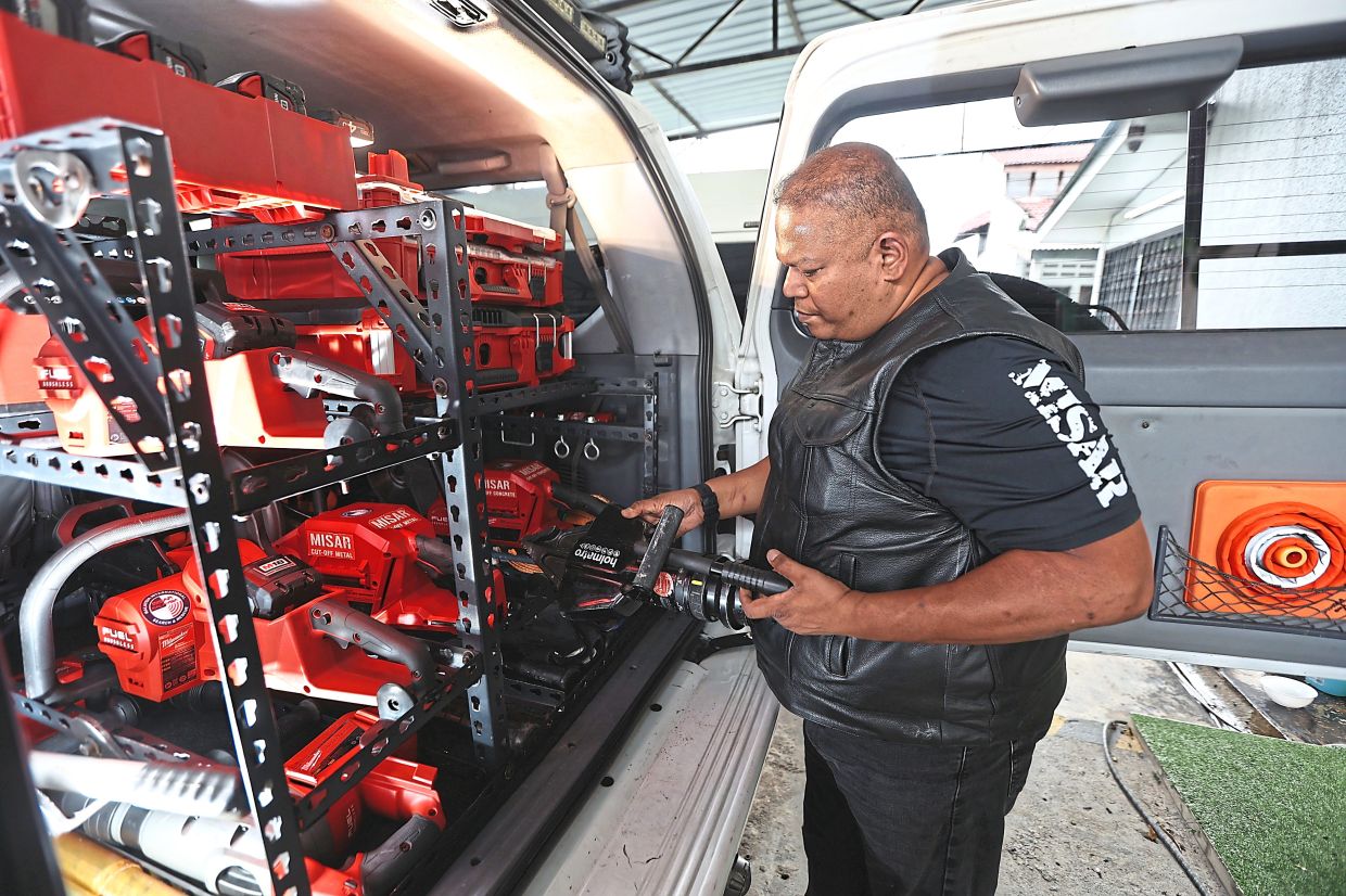 Tools of the trade: Bala displaying the many advanced rescue equipment Misar uses during a search and rescue operation.