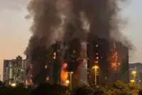 Fire engulfs Hong Kong residential blocks, killing at least four