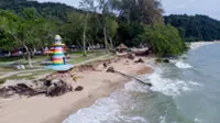 Teluk Batik Beach eroded by two-metre waves, water activities banned