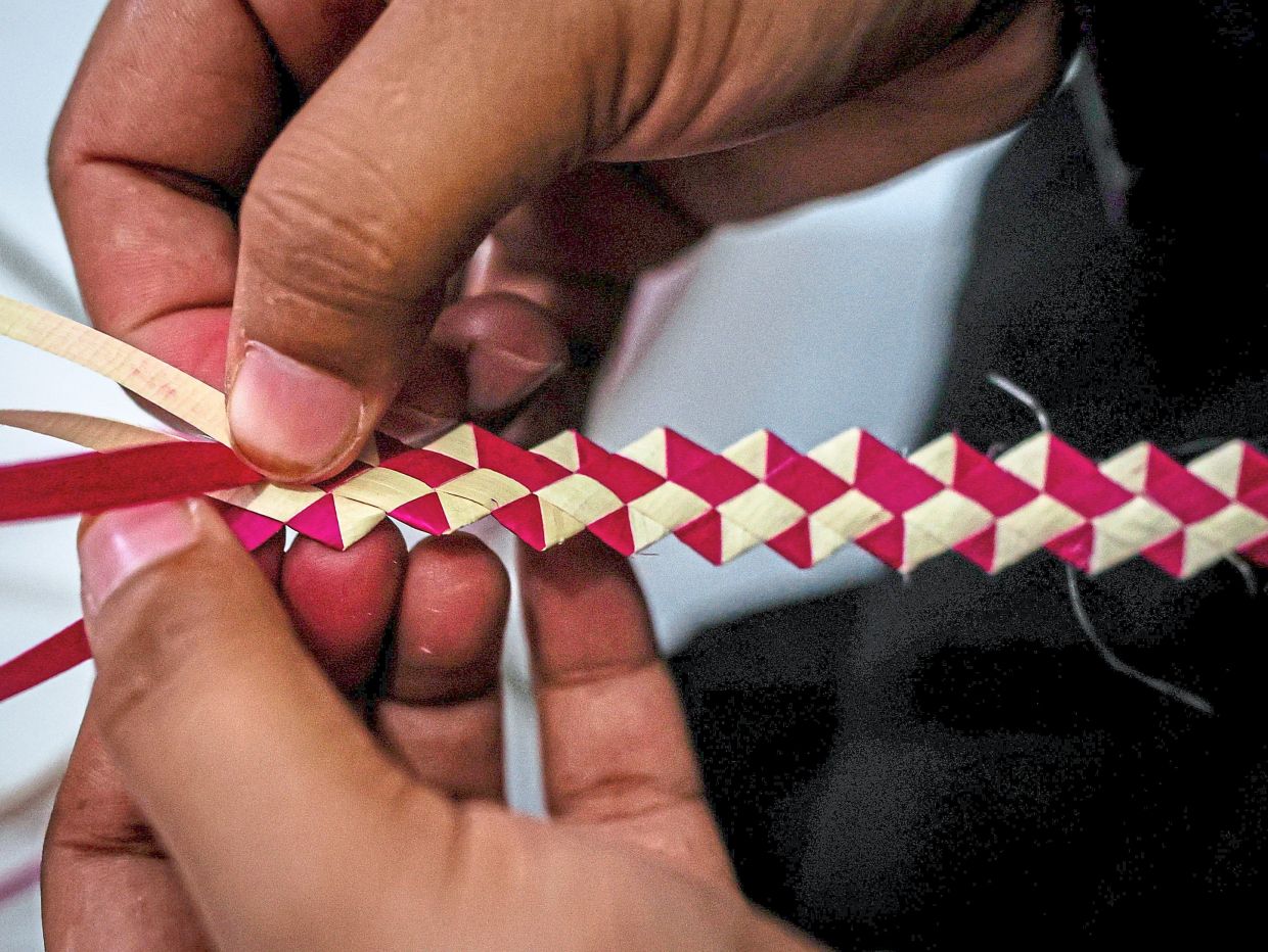 Geometric design of ‘tudung duang’ mirrors traditional clothing of the Bajau Samah community in Sabah. 