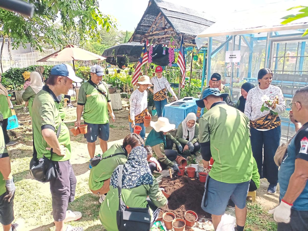 A CSR project being carried out at the garden in Subang Jaya.