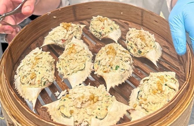 The Christmas buffet offering at Vasco’s includes steamed crab (above) and roasted venison (below).