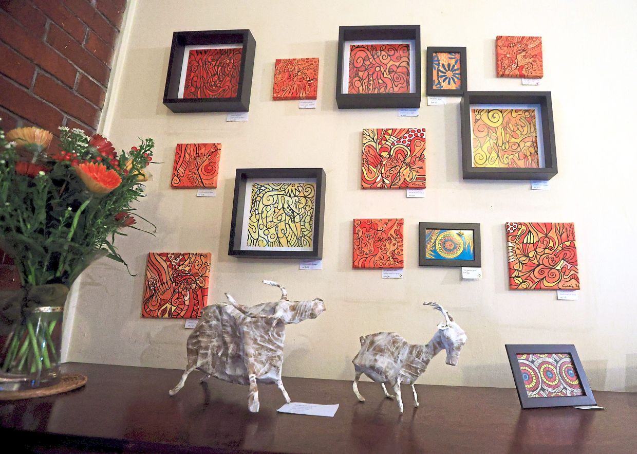 Ciaramicoli's exhibition comprises watercolour and acrylic paintings, as well as papier mache sculptures. Photo: The Star/Chan Tak Kong