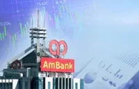 AmBank hikes payout after record 1H